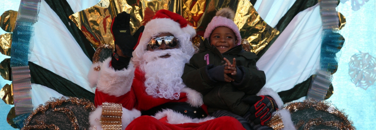 A young girl and Santa Clause at the Annual Christmas Celebration