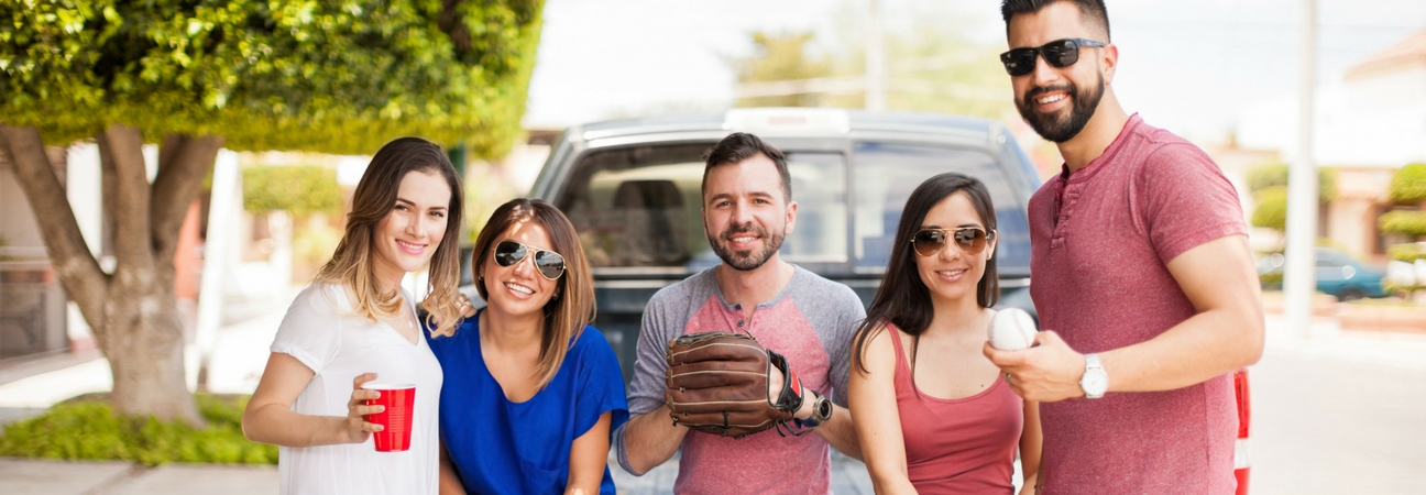A group of young men and women tailgating featured in a blog post about used Toyota cars