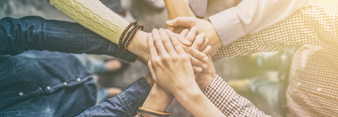 Hands joining in circle