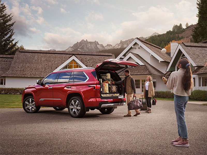 A Gold Certified Used Toyota SUV being loaded up for a family road trip.