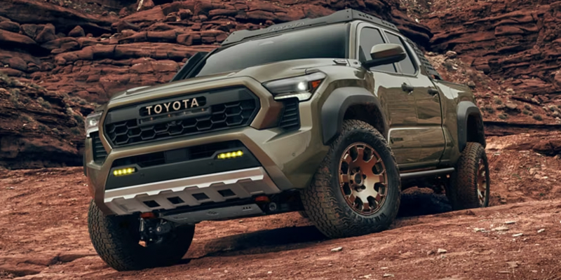 Image of a used 2021 Toyota Tacoma, showcasing its rugged design and features.